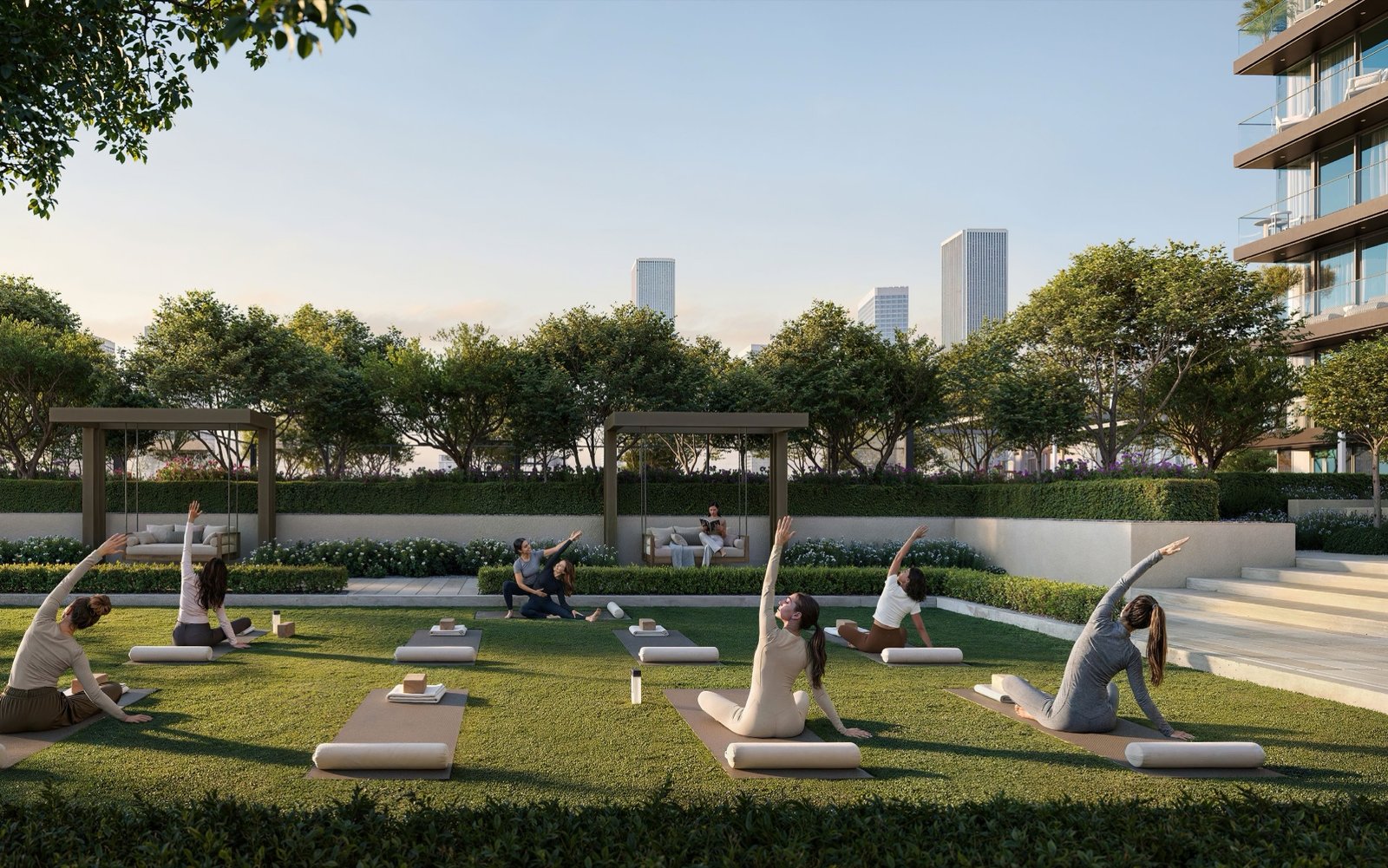 A yoga class on the lawn at sunrise, swing seats behind